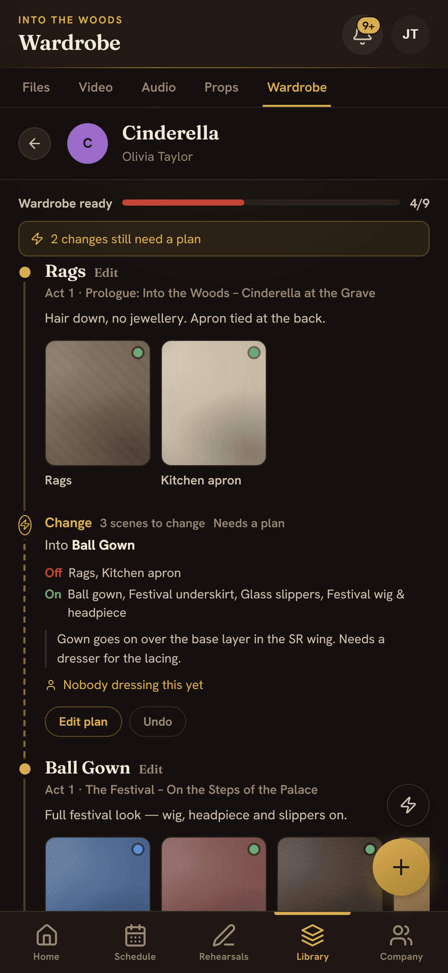 Cinderella's wardrobe page: her looks as stations down one thread, each garment photographed, with a flagged costume change showing what comes off, what goes on, and that nobody is dressing it yet